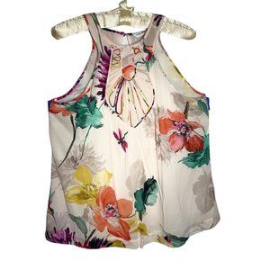 Trina Turk top, sleeveless, size medium, floral with a light background